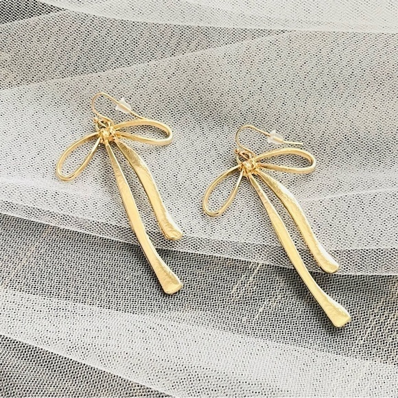 Anthropologie Jewelry - Bow gold hanging earrings oversized coquette